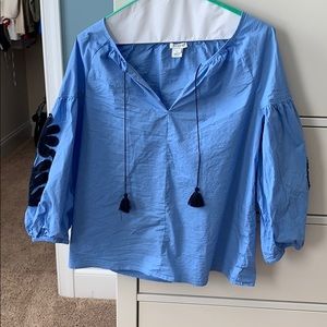 Shirt—xtra small but is not tight at all!